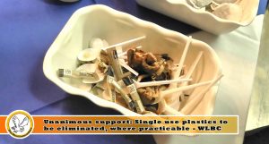 Picture of single use plastic spoons mixed with used tea bags